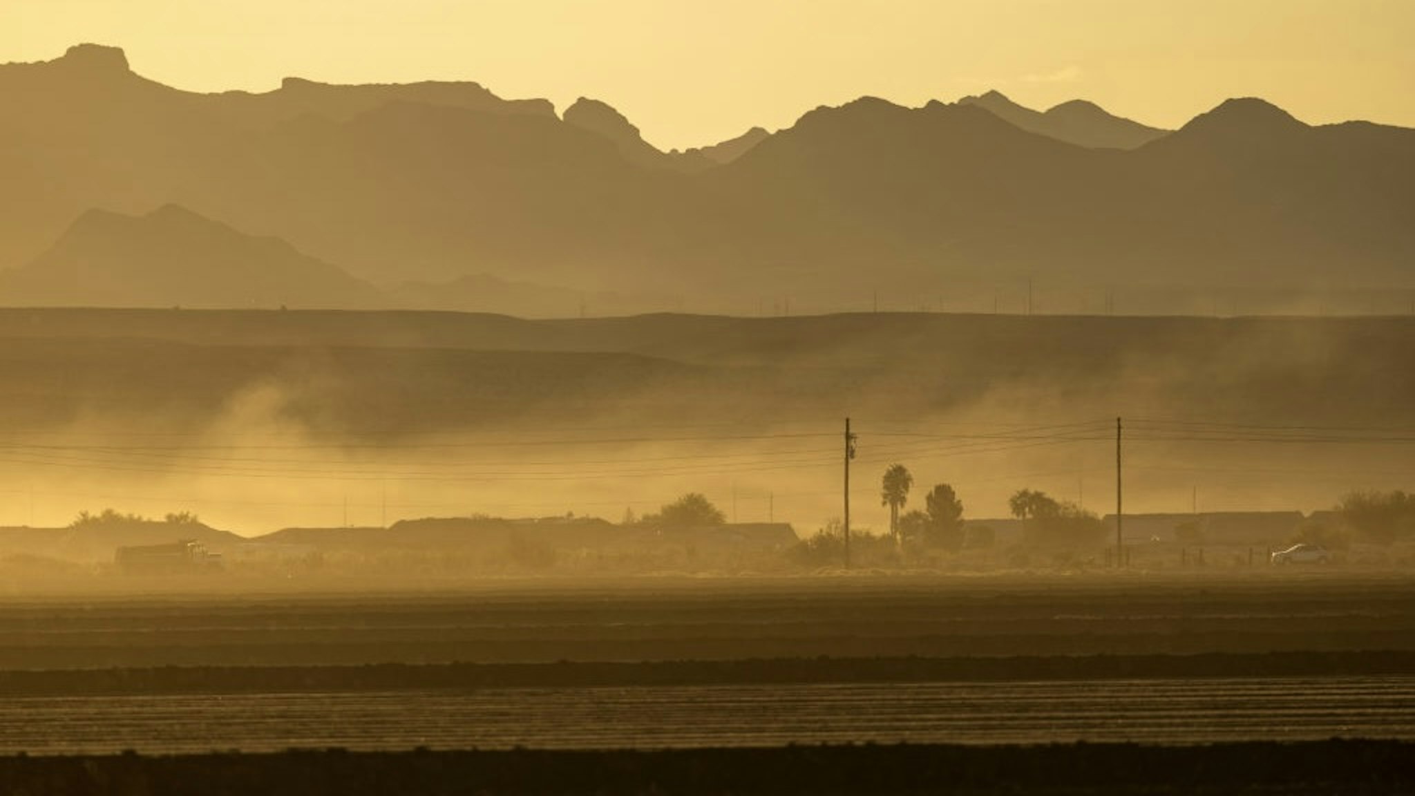 Southwest Faces Severe Drought Conditions NEEDLES, CA - SEPTEMBER 23: Farmland is seen at sunrise on the Arizona side of the Colorado River on September 23, 2022 near Needles, California. The federal government has proposed an unprecedented plan to cut back on water supplies for Arizona, Nevada and California, where millions of people rely on its water and power, as climate change-driven drought continues to lower water levels at the biggest reservoirs in the nation, lakes Mead and Powell, to historic low capacities. (Photo by David McNew/Getty Images) David McNew / Contributor