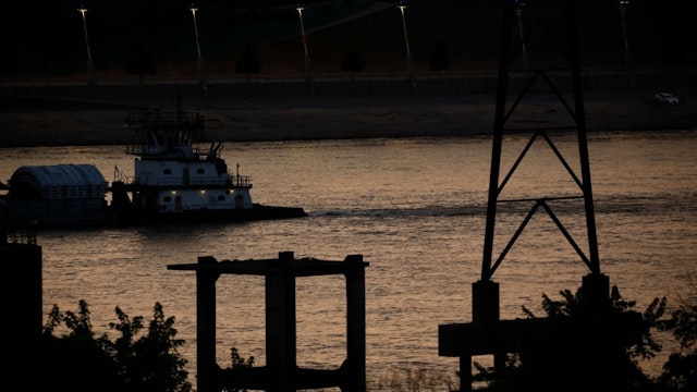 Barges On Mississippi River As Grain Shipments Falls An Osage Marine Services towboat at sunset along the Mississippi River in St. Louis, Missouri, US, on Thursday, July 7, 2022. Shipments along the Mississippi, Illinois, Ohio and Arkansas rivers declined in the week ending June 25 from the previous week, according to the USDA's weekly grain transportation report. Photographer: Luke Sharrett/Bloomberg via Getty Images Bloomberg / Contributor