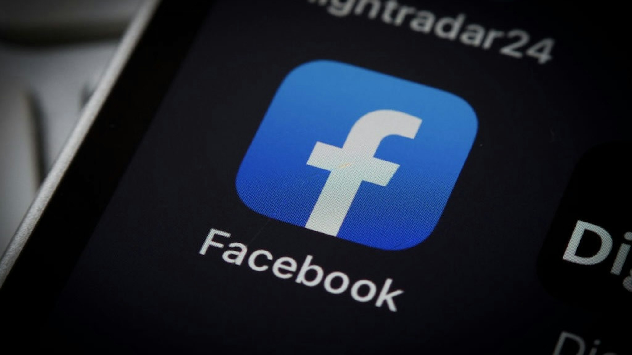 Social Media Illustrations The Facebook logo is seen on an iPhone mobile device in this illustration photo in Warsaw, Poland on 12 October, 2022. (Photo by STR/NurPhoto via Getty Images) NurPhoto / Contributor
