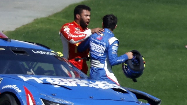 LAS VEGAS, NV - OCTOBER 16: Bubba Wallace (#45 23XI Racing MoneyLion Toyota) has an altercation with Kyle Larson (#5 Hendrick Motorsports HendrickCars.com Chevrolet) after Wallace collided into Larson during the South Point 400 NASCAR Cup Series Playoff race on October 16, 2022, at Las Vegas Motor Speedway in Las Vegas, NV.