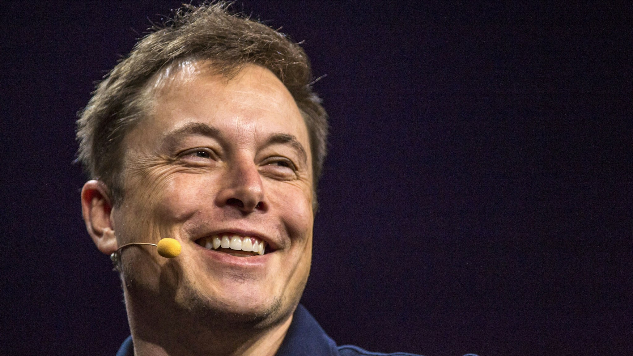 Elon Musk, co-founder and chief executive officer of Tesla Motors Inc., smiles during the GPU Technology Conference (GTC) in San Jose, California, U.S., on Tuesday, March 17, 2015. Musk said that well take autonomous cars for granted in a short period of time and signaled that the automaker plans to be a leader in the nascent market.