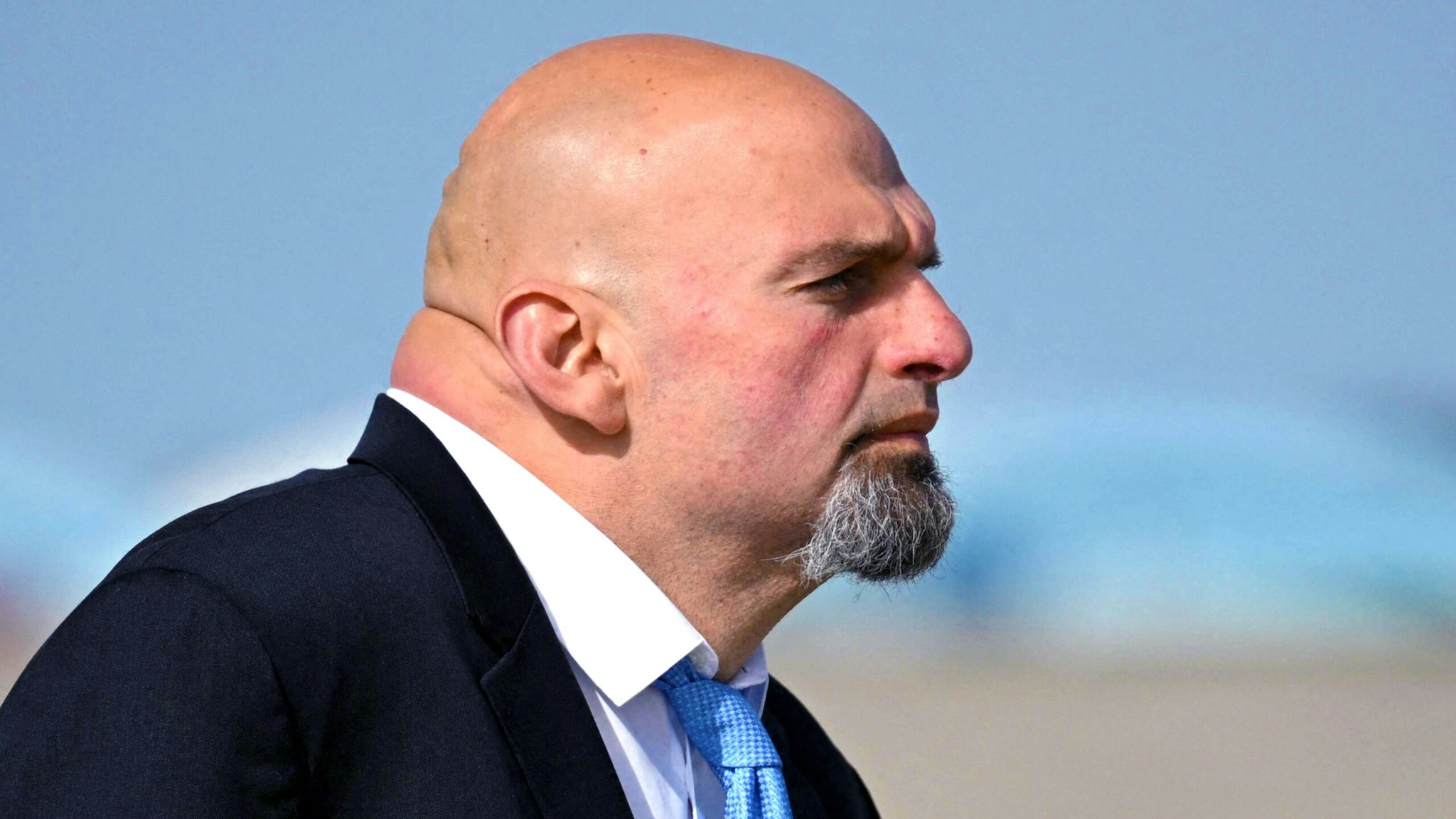 Pennsylvania Lt. Gov. and Democratic senatorial candidate John Fetterman waits for US President Joe Biden to step off Air Force One at Pittsburgh International Airport in Pittsburgh, Pennsylvania, on October 20, 2022.