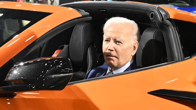 US President Joe Biden sits in a Chevrolet Corvette Z06 as he tours the 2022 North American International Auto Show at Huntington Place Convention Center in Detroit, Michigan on September 14, 2022. - Biden is visiting the auto show to highlight electric vehicle manufacturing. (Photo by Mandel NGAN / AFP) (Photo by MANDEL NGAN/AFP via Getty Images)