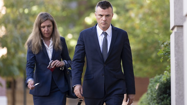 Russian analyst Igor Danchenko walks to the Albert V. Bryan U.S. Courthouse during a break in his trial on October 11, 2022 in Alexandria, Virginia. Danchenko faces five counts of lying to the FBI over his sources as to claims made in the Christopher Steele Dossier as part of the investigation of Special Counsel John Durham into the origins of the FBI probe of alleged collusion between Russia and the 2016 Trump presidential campaign.