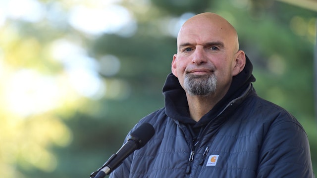 Democratic candidate for U.S. Senate John Fetterman reacts to applause from supporters during a joint rally with Democratic candidate for Governor Pennsylvania Attorney General Josh Shapiro at Norris Park on October 15, 2022 in Philadelphia, Pennsylvania.
