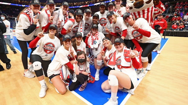 The Wisconsin Badgers celebrate after defeating the Nebraska Cornhuskers during the Division I Women's Volleyball Championship on December 18, 2021 in Columbus, Ohio.