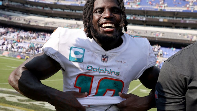 BALTIMORE, MARYLAND - SEPTEMBER 18: Tyreek Hill #10 of the Miami Dolphins celebrates after a 42-38 win over the Baltimore Ravens at M&amp;T Bank Stadium on September 18, 2022 in Baltimore, Maryland. (Photo by Patrick Smith/Getty Images)