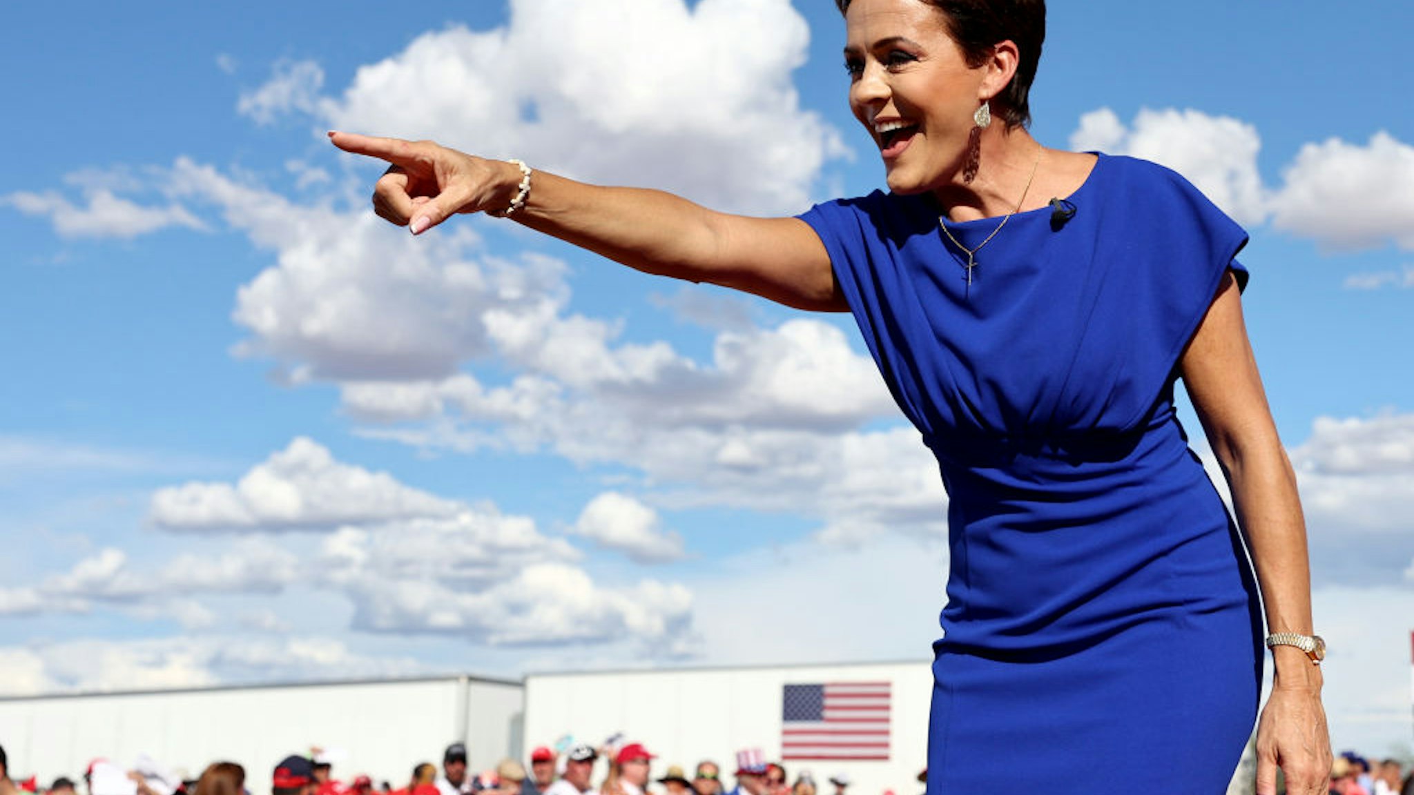 MESA, ARIZONA - OCTOBER 09: Arizona Republican nominee for governor Kari Lake points to the crowd at a 'Save America!' campaign rally with former U.S. President Donald Trump at Legacy Sports USA on October 09, 2022 in Mesa, Arizona. Former U.S. President Donald Trump is holding a campaign style rally for Arizona GOP candidates ahead of the state's midterm election on November 8th. (Photo by Mario Tama/Getty Images)