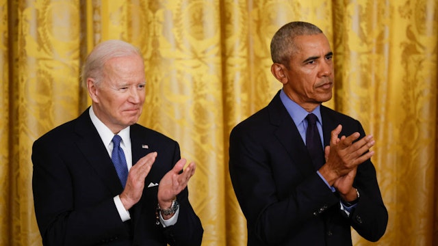 WASHINGTON, DC - APRIL 5: U.S. President Joe Biden and former President Barack Obama attend an event to mark the 2010 passage of the Affordable Care Act in the East Room of the White House on April 5, 2022 in Washington, DC. With then-Vice President Joe Biden by his side, Obama signed 'Obamacare' into law on March 23, 2010. (Photo by Chip Somodevilla/Getty Images)