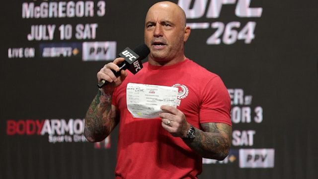 UFC commentator Joe Rogan announces the fighters during a ceremonial weigh in for UFC 264 at T-Mobile Arena on July 09, 2021 in Las Vegas, Nevada.