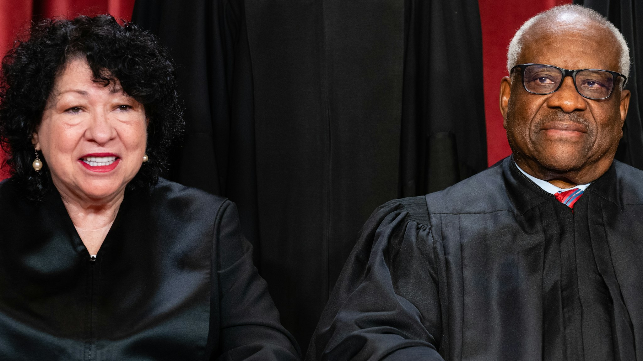 Associate Justice Sonia Sotomayor, left, and Associate Justice Clarence Thomas during the formal group photograph at the Supreme Court in Washington, DC, US, on Friday, Oct. 7, 2022.
