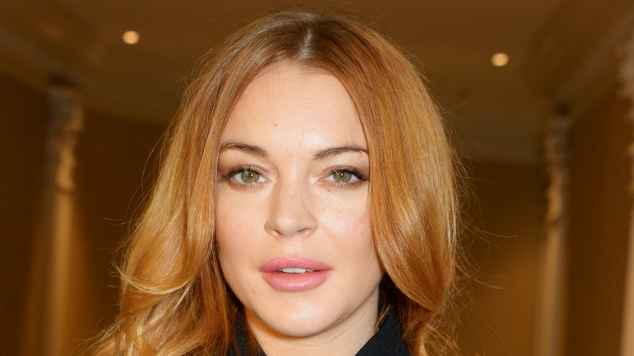 Lindsay Lohan attends The 59th Women of the Year Lunch at the InterContinental Park Lane Hotel on October 13, 2014 in London, England.