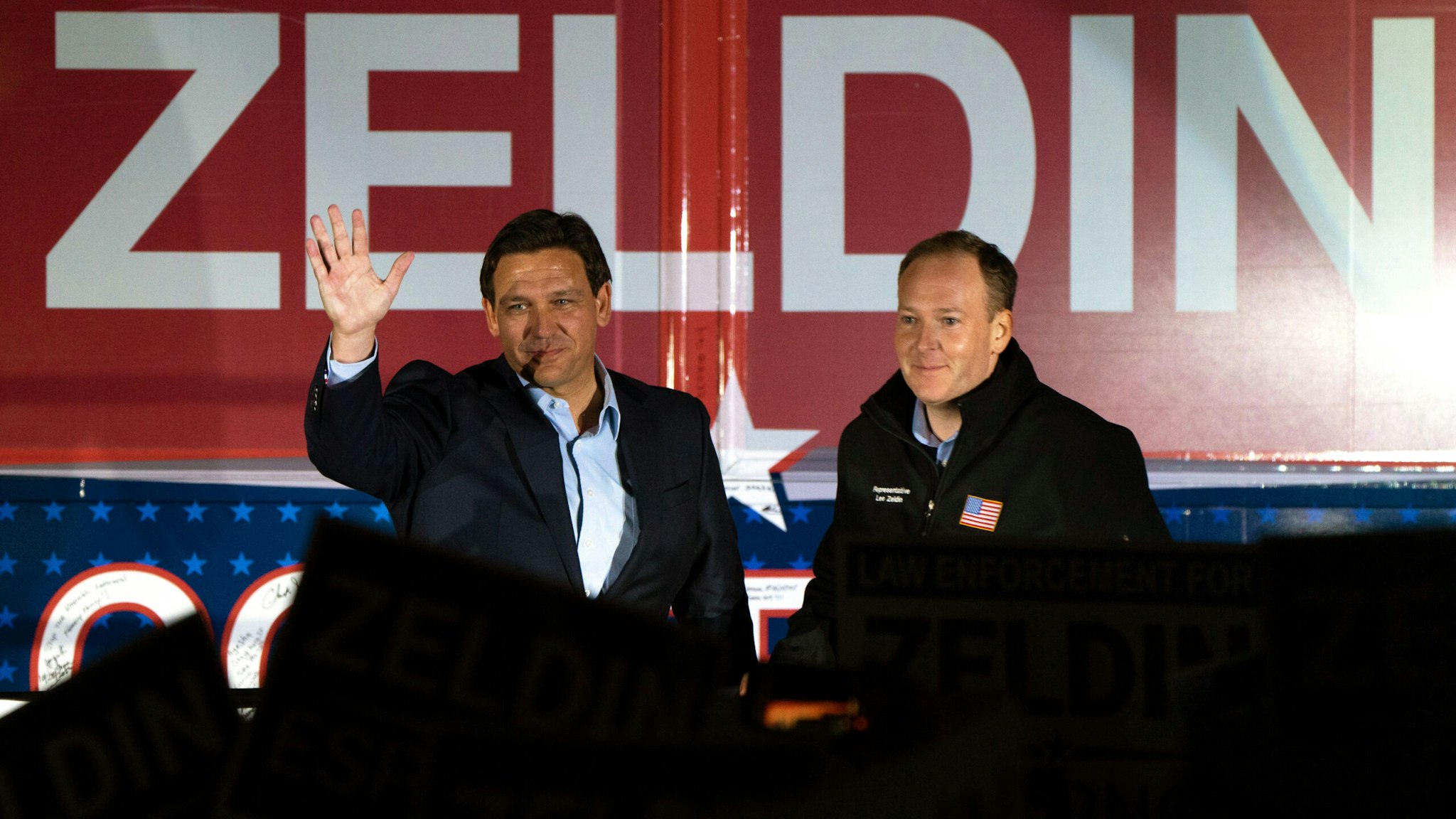 HAUPPAUGE, NY - OCTOBER 29: Florida Gov. Ron DeSantis (L) campaigns alongside New York Republican gubernatorial hopeful, Rep. Lee Zeldin (R) at a Get Out The Vote Rally on October 29, 2022 in Hauppauge, New York. Zeldin has closed the gap in recent polls to four points after the head to head debate against New York Governor Kathy Hochul. DeSantis, who's running for reelection himself, makes his latest political appearance outside his home state amid increasing rumors of a 2024 presidential run.