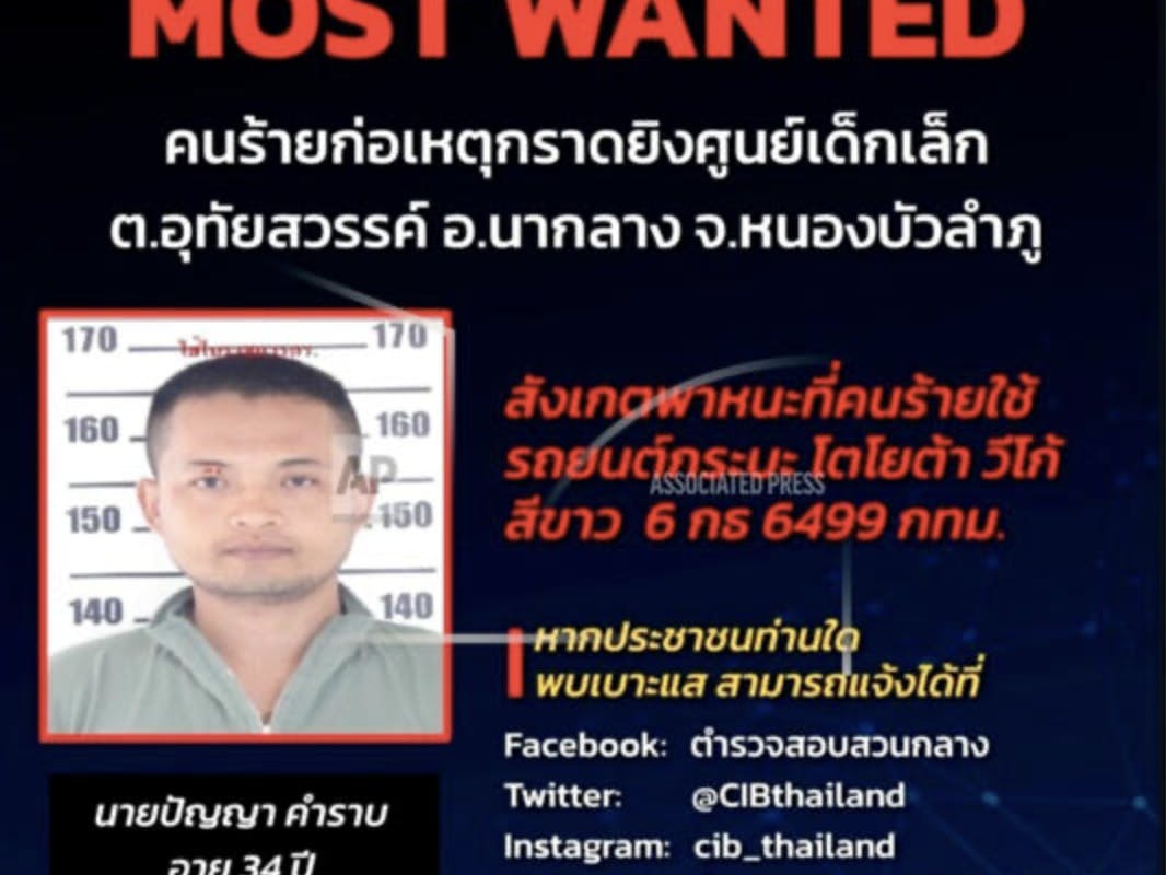 An ex-police officer slaughtered at least 34 people, including at least 23 children, at a Thailand daycare center before escaping, officials said.