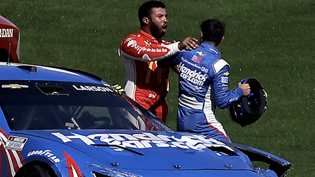 LAS VEGAS, NEVADA - OCTOBER 16: Bubba Wallace, driver of the #45 McDonald's Toyota, confronts Kyle Larson, driver of the #5 HendrickCars.com Chevrolet, after an on-track incident during the NASCAR Cup Series South Point 400 at Las Vegas Motor Speedway on October 16, 2022 in Las Vegas, Nevada.