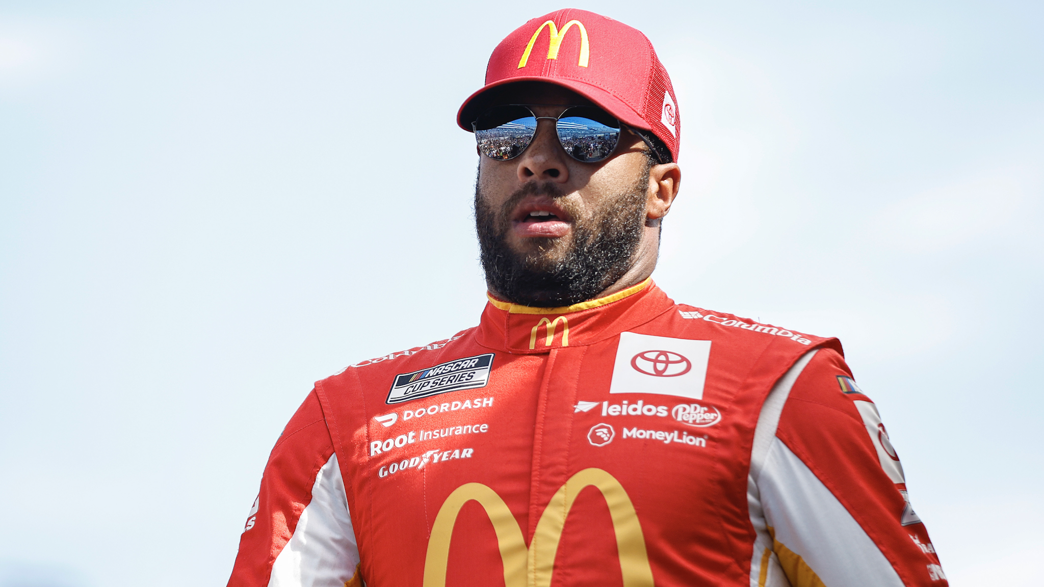 LAS VEGAS, NEVADA - OCTOBER 16: Bubba Wallace, driver of the #45 McDonald's Toyota, walks onstage during driver intros prior to the NASCAR Cup Series South Point 400 at Las Vegas Motor Speedway on October 16, 2022 in Las Vegas, Nevada.
