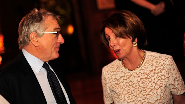 Actor Robert de Niro, left, and House Minority Leader Nancy Pelosi, a Democrat from California, attend the Bloomberg Vanity Fair White House Correspondents' Association (WHCA) dinner afterparty in Washington, D.C., U.S., on Saturday, May 3, 2014. The WHCA, celebrating its 100th anniversary, raises money for scholarships and honors the recipients of the organization's journalism awards.