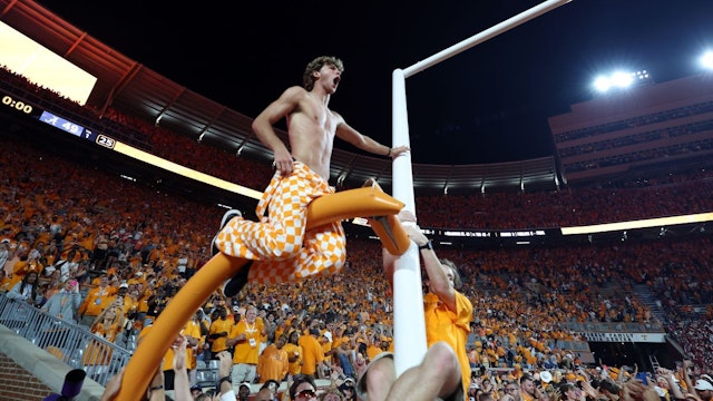 Tennessee Volunteers fans tear down the goal post while celebrating a win over the Alabama Crimson Tide at Neyland Stadium on October 15, 2022 in Knoxville, Tennessee. Tennessee won the game 52-49.