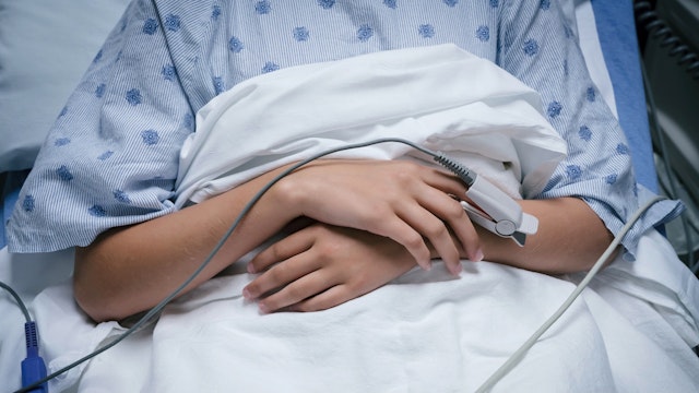 Monitor on finger of Caucasian girl in hospital - stock photo FS Productions via Getty Images