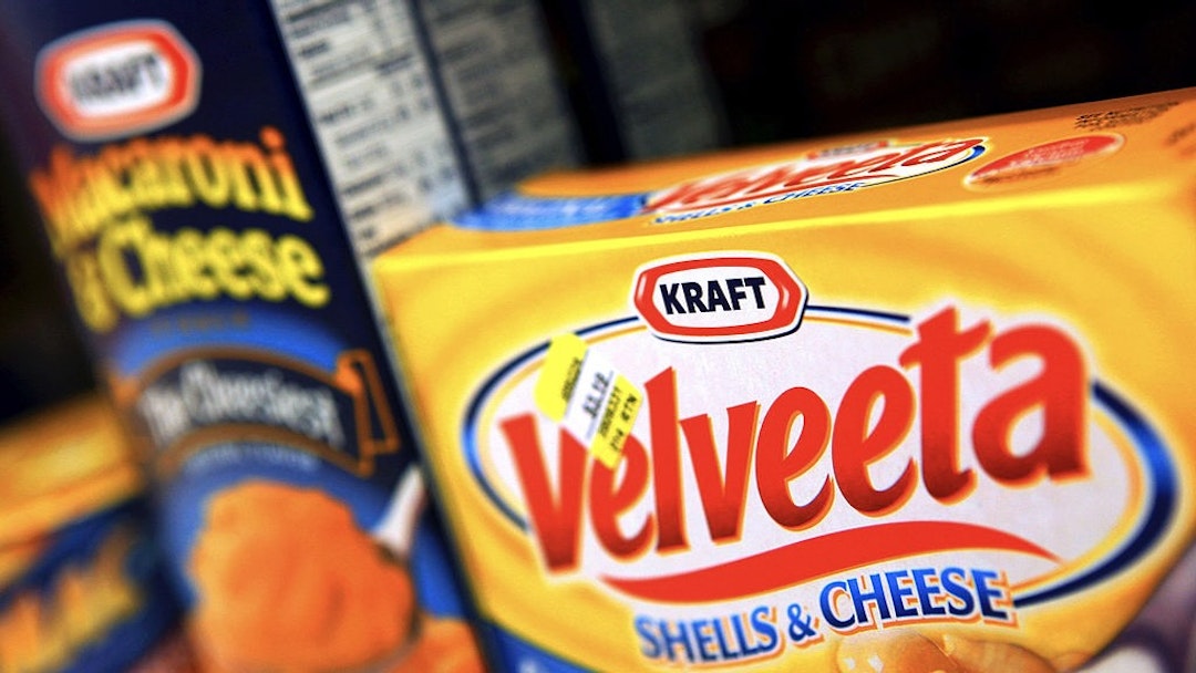 Cadbury Accepts Kraft's Raised 11.9 ($19.7) Billion Pound Offer Boxes of Kraft Foods Inc. Velveeta Shells & Cheese and Macaroni & Cheese sit on a shelf in a convenience store in Des Plaines, Illinois, U.S., on Tuesday, Jan. 19, 2010. Cadbury Plc agreed to an improved 11.9 billion-pound ($19.7 billion) offer from Kraft Foods Inc., ending more than four months of resistance and creating the world's largest confectioner. Photographer: Tim Boyle/Bloomberg via Getty Images News Bloomberg / Contributor via Getty Images