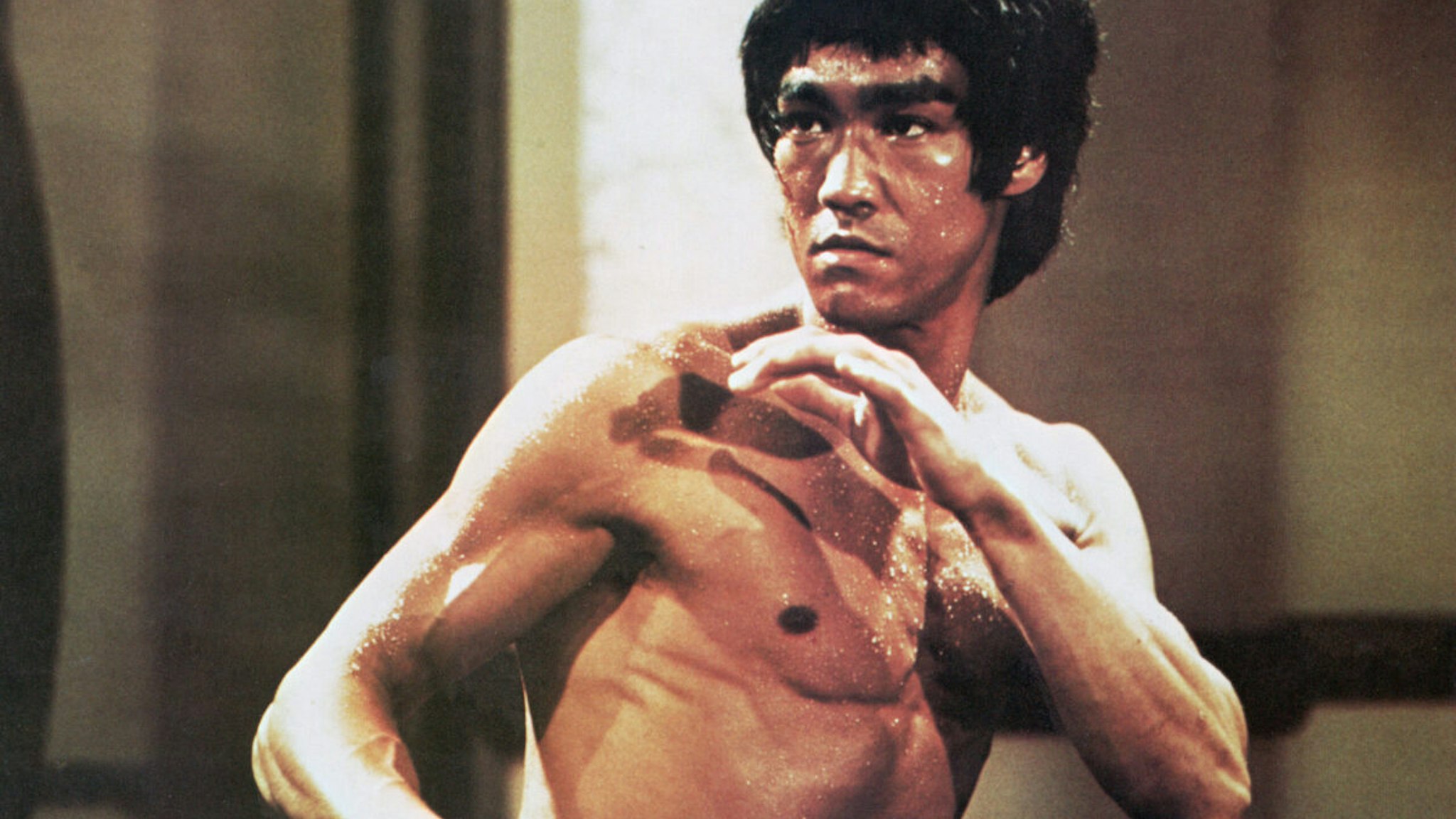Chinese-American martial arts exponent Bruce Lee (1940 - 1973), in a karate stance, early 1970s