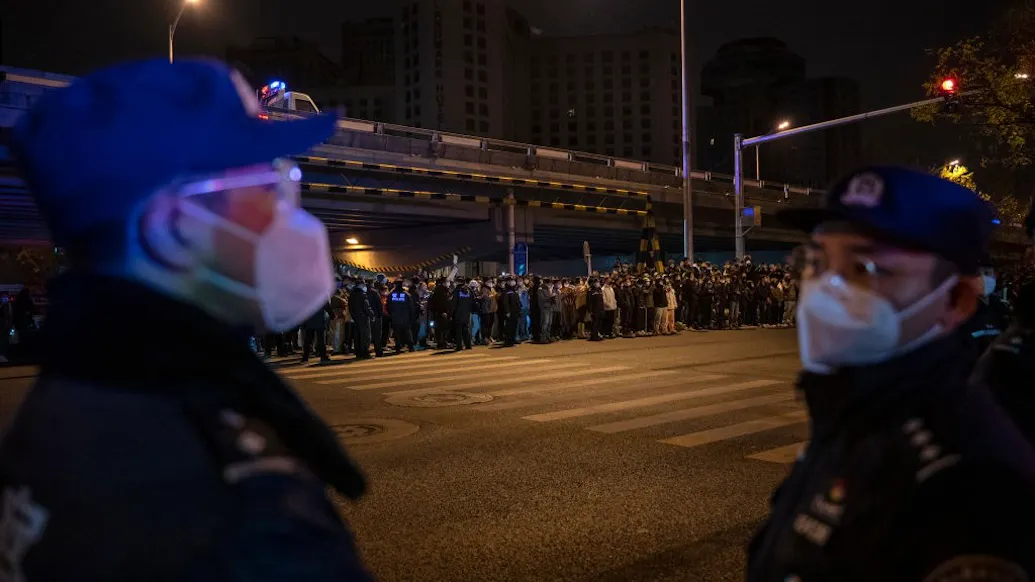 Chinese Cities Cut Back COVID Restrictions After Protests