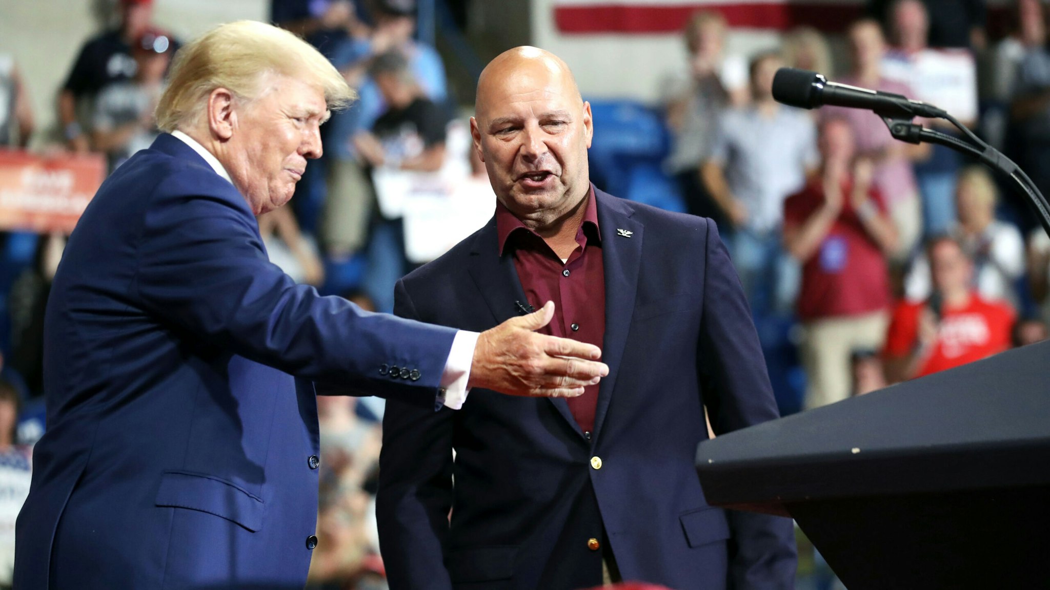 WILKES-BARRE, PENNSYLVANIA - SEPTEMBER 03: Pennsylvania Republican gubernatorial candidate Doug Mastriano is greeted by former president Donald Trump at a rally to support local candidates at the Mohegan Sun Arena on September 03, 2022 in Wilkes-Barre, Pennsylvania. Trump still denies that he lost the election against President Joe Biden and has encouraged his supporters to doubt the election process. Trump has backed Senate candidate Mehmet Oz and gubernatorial hopeful Doug Mastriano.