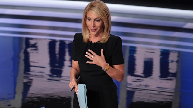 DETROIT, MICHIGAN - JULY 31: CNN moderator Dana Bash speaks to the crowd attending the Democratic Presidential Debate at the Fox Theatre July 31, 2019 in Detroit, Michigan. 20 Democratic presidential candidates were split into two groups of 10 to take part in the debate sponsored by CNN held over two nights at Detroit’s Fox Theatre. (Photo by Scott Olson/Getty Images)