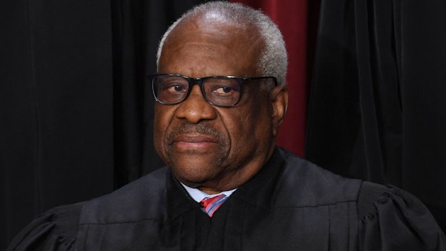 Associate US Supreme Court Justice Clarence Thomas poses for the official photo at the Supreme Court in Washington, DC on October 7, 2022. (Photo by OLIVIER DOULIERY / AFP) (Photo by OLIVIER DOULIERY/AFP via Getty Images)