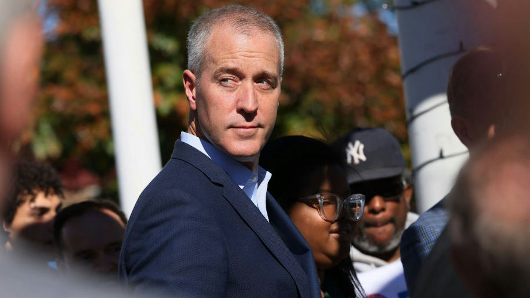 Rep. Sean Patrick Maloney (D-NY) looks into the crowd as he listens to Former President Bill Clinton speak during a rally at Nyack Veteran's Memorial Park on October 29, 2022 in Nyack, New York.
