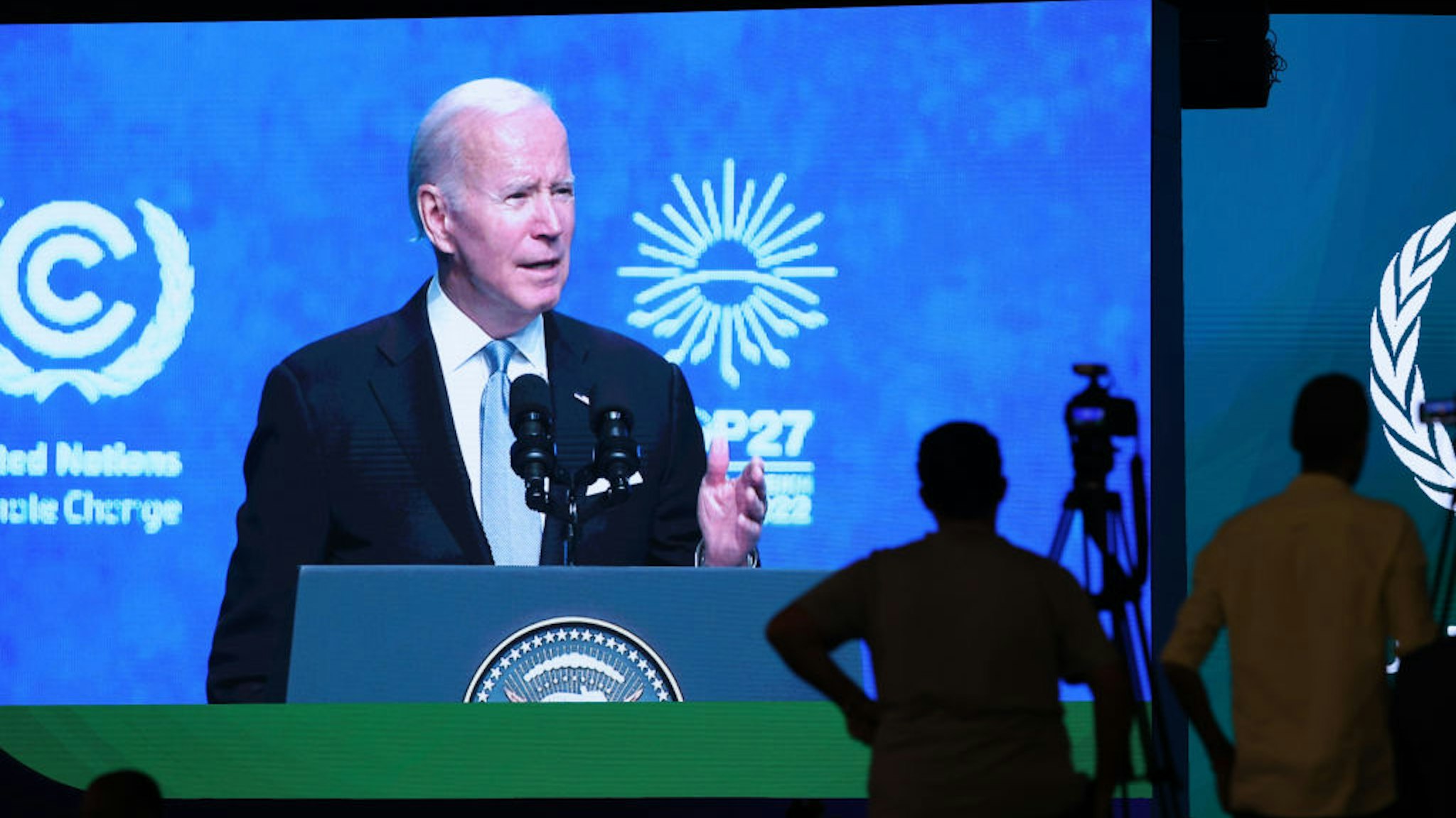 SHARM EL SHEIKH, EGYPT - NOVEMBER 11: U.S. President Joe Biden is seen on a large-screen video monitor as he speaks at the UNFCCC COP27 climate conference on November 11, 2022 in Sharm El Sheikh, Egypt. The conference is bringing together political leaders and representatives from 190 countries to discuss climate-related topics including climate change adaptation, climate finance, decarbonisation, agriculture and biodiversity. The conference is running from November 6-18. (Photo by Sean Gallup/Getty Images)