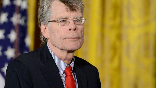 WASHINGTON, DC - SEPTEMBER 10: President Barack Obama presents author Stephen King with the 2014 National Medal of Arts at The White House on September 10, 2015 in Washington, DC. (Photo by Leigh Vogel/WireImage)