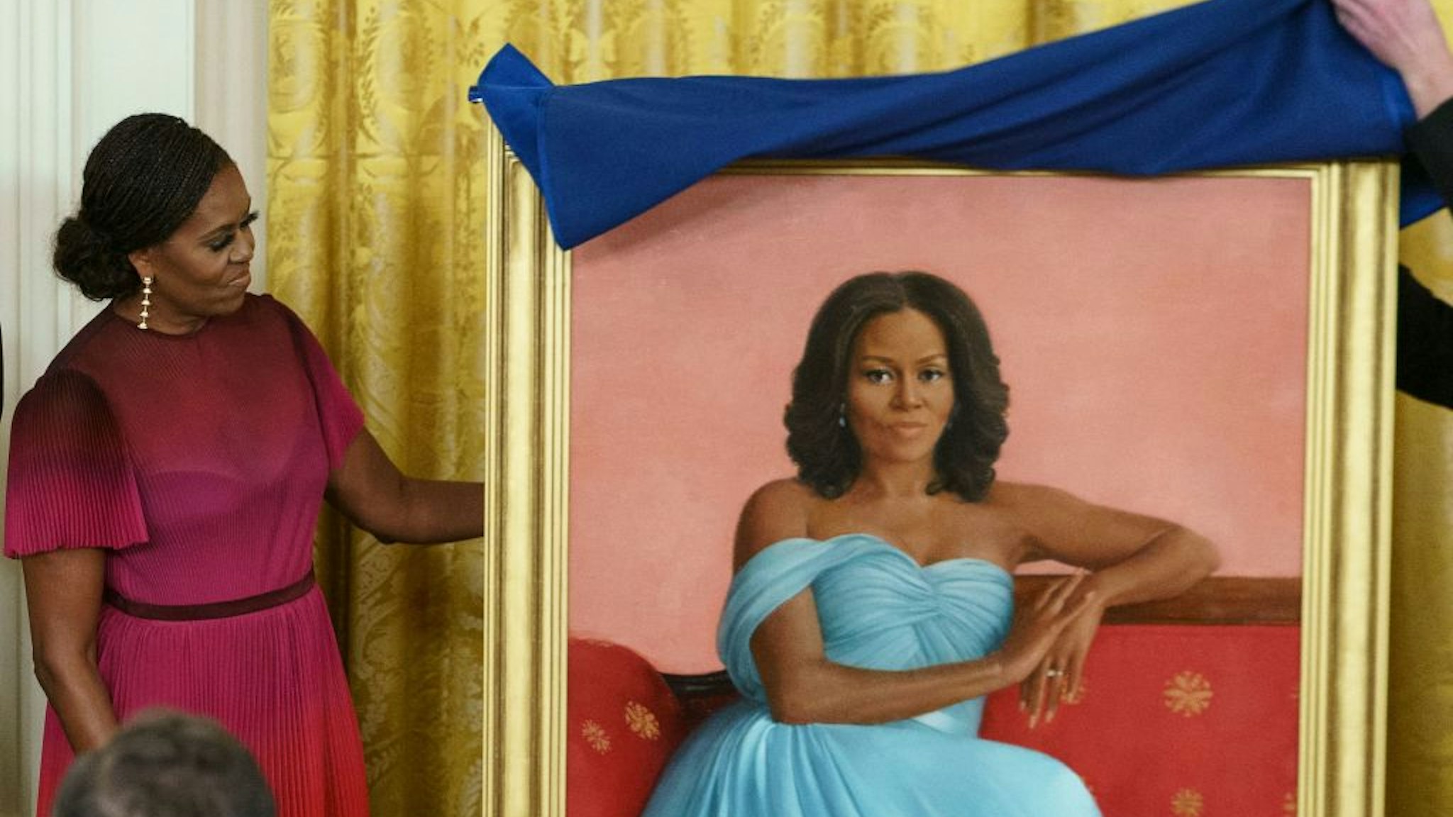 Former US First Lady Michelle Obama participates in a ceremony to unveil her official White House portrait, in the East Room of the White House in Washington, DC, on September 7, 2022.