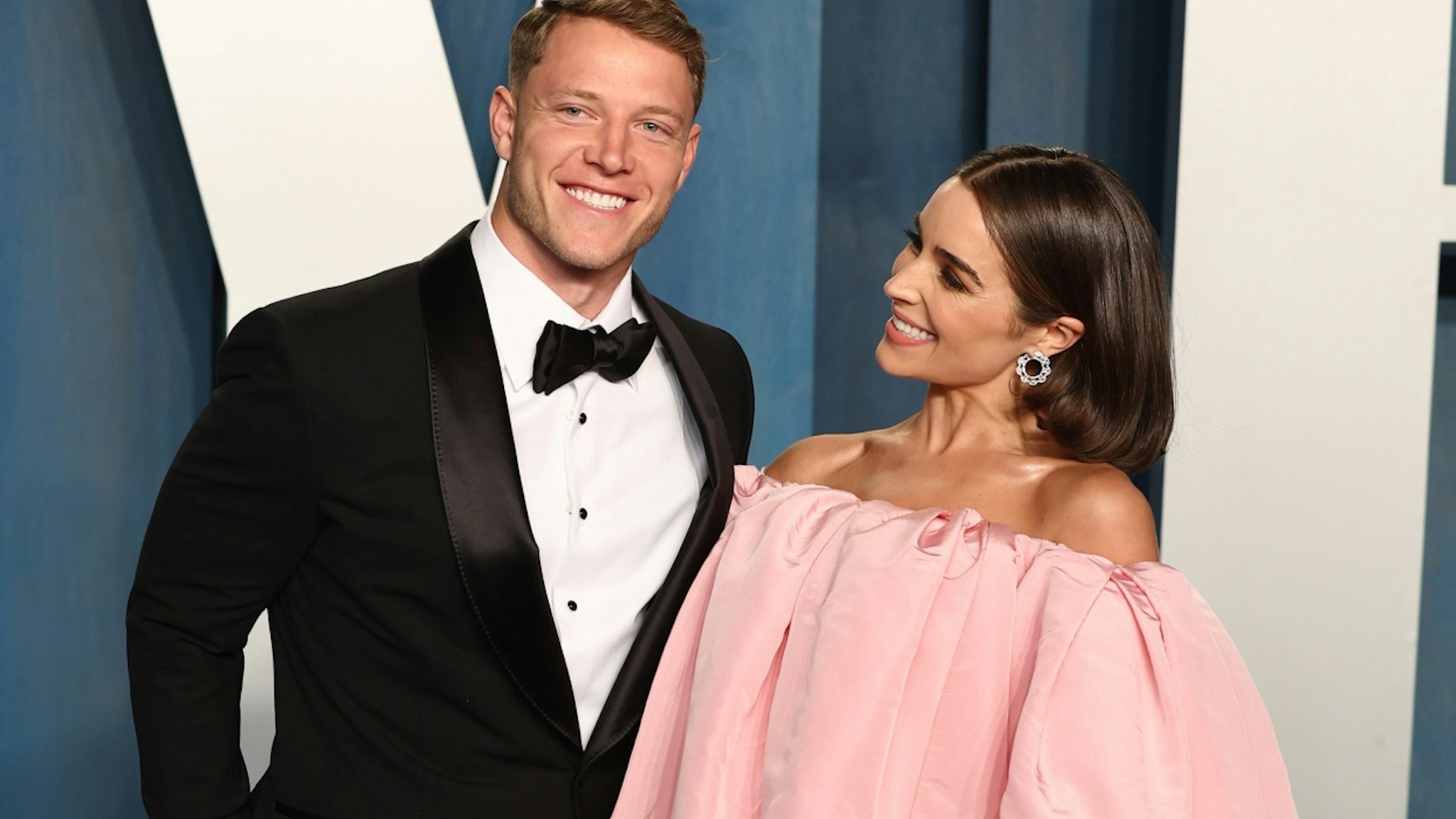 Christian McCaffrey and Olivia Culpo attend the 2022 Vanity Fair Oscar Party hosted by Radhika Jones at Wallis Annenberg Center for the Performing Arts on March 27, 2022 in Beverly Hills, California.
