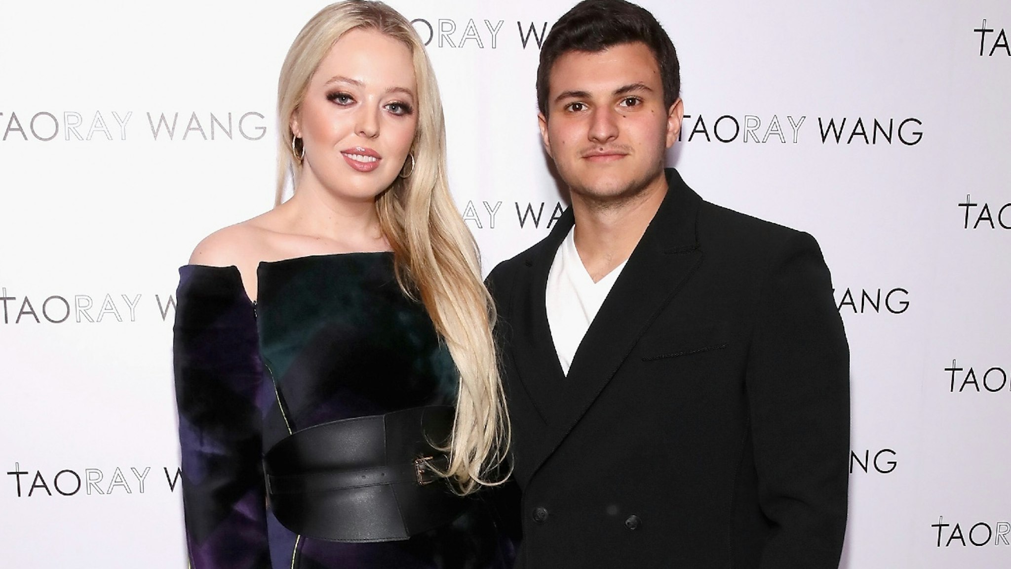 Tiffany Trump (L) and Michael Boulos pose backstage for Taoray Wang fashion show during New York Fashion Week: The Shows at Gallery II at Spring Studios on February 9, 2019 in New York City.