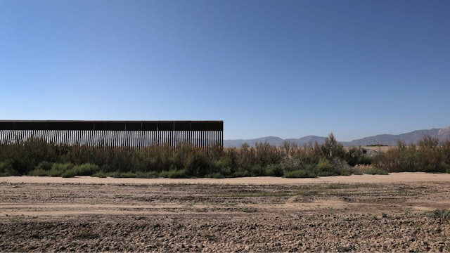 FORT HANCOCK, TX - OCTOBER 14: The U.S.-Mexico border fence stops while passing through farmland on October 14, 2016 near Fort Hancock, Texas. Throughout vast stretches of West Texas, the fence starts and stops along the bank of the Rio Grande, which is often nearly drained due to irrigation for crops.