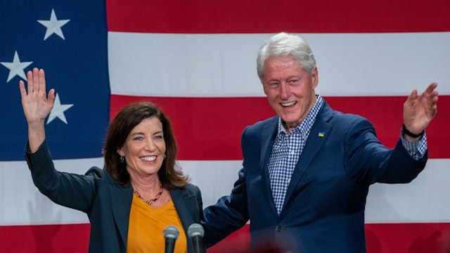 NEW YORK, NY - NOVEMBER 05: Gov. Kathy Hochul (D-NY) greets Former President Bill Clinton on stage at a Get Out The Vote rally on November 5, 2022 in New York City. Former President Bill Clinton joined Gov. Kathy Hochul along with other democrats on the ticket at a New York GOTV rally. Hochul holds a slim lead in the polls against Republican candidate Rep. Lee Zeldin.
