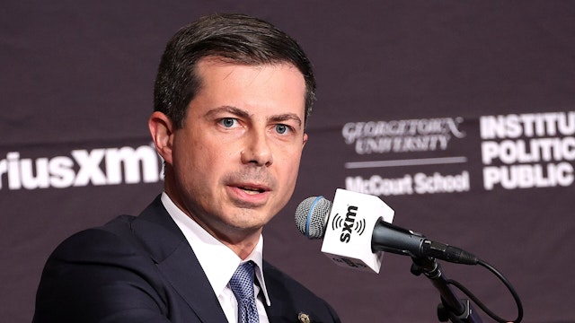 WASHINGTON, DC - OCTOBER 11: Secretary of Transportation Pete Buttigieg participates in a SiriusXM and GU Politics Townhall event, hosted by Julie Mason of SiriusXM and Mo Elleithee of GU Politics, on infrastructure at Georgetown University on October 11, 2022 in Washington, DC.