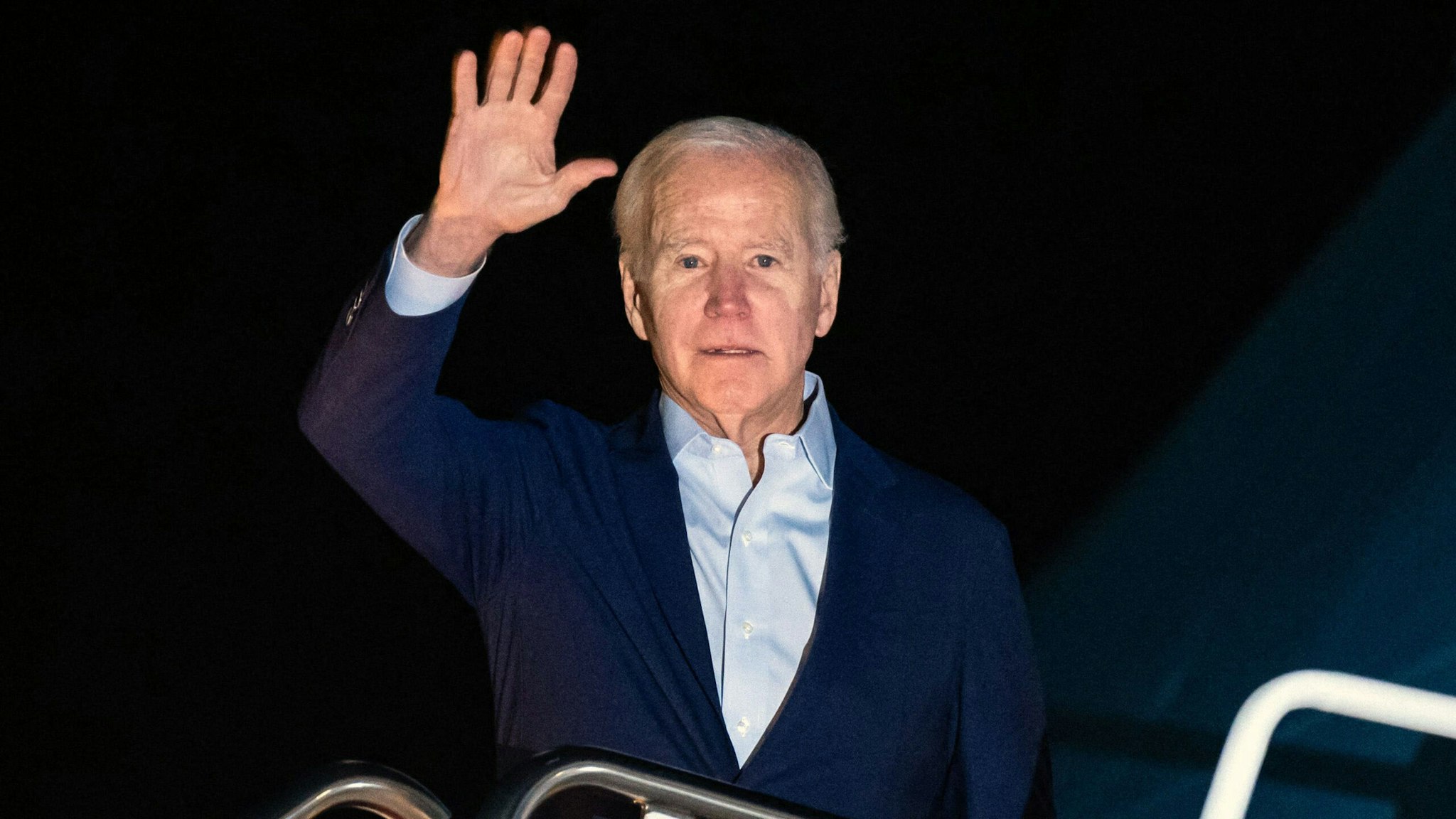 US President Joe Biden boards Air Force One at Joint Base Andrews in Maryland on December 27, 2022. - The President and First Lady are travelling to the US Virgin Islands to celebrate the New Year with family.