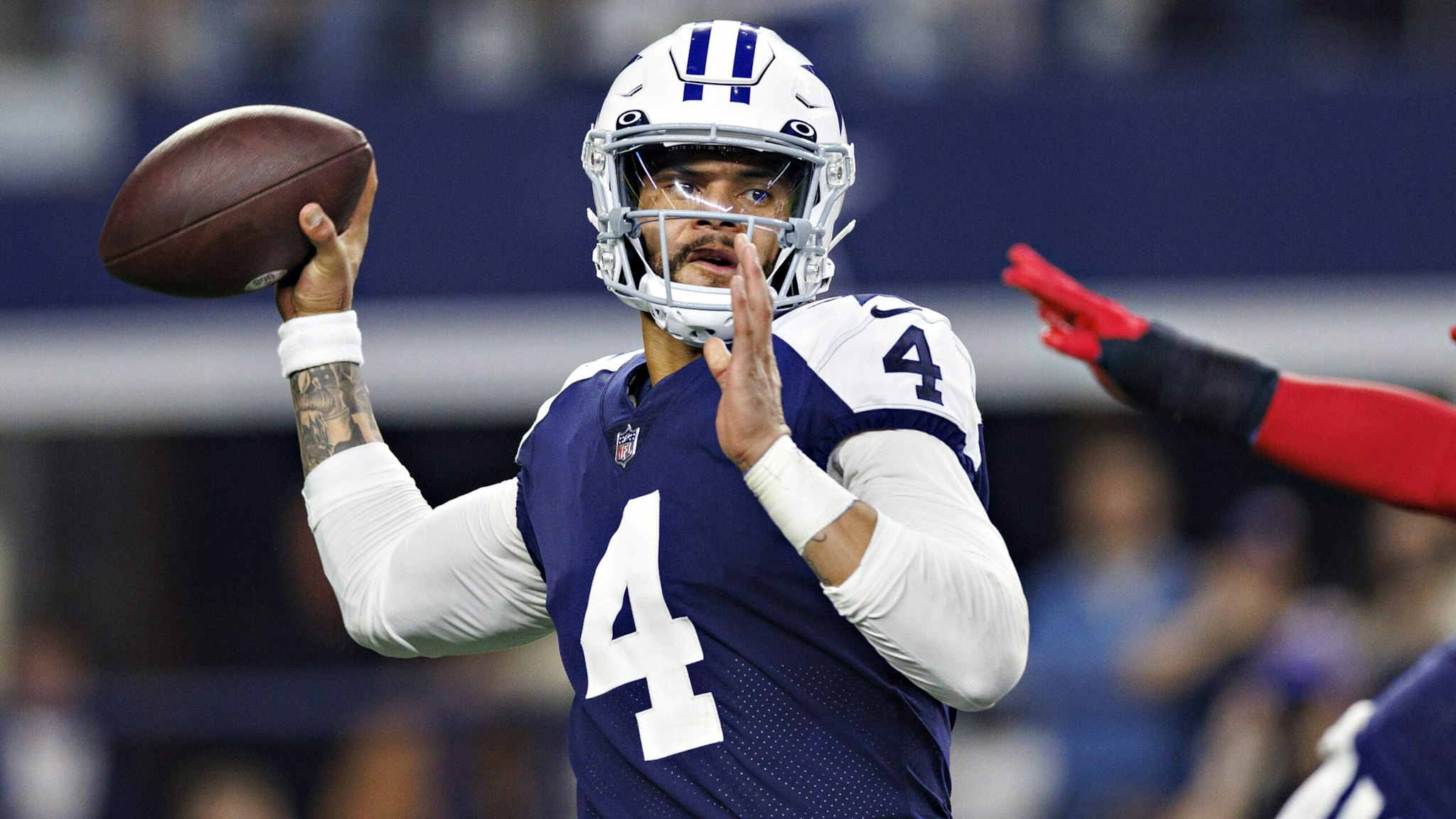 ARLINGTON, TEXAS - NOVEMBER 24: Dak Prescott #4 of the Dallas Cowboys throws a pass during a game against the New York Giants at AT&amp;T Stadium on November 24, 2022 in Arlington, Texas. The Cowboys defeated the Giants 28-20.