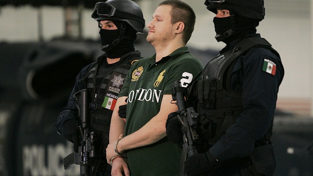 Edgar "La Barbie" Valdez Villarreal is shown to the press during a news conference at the federal police center August 31, 2010 in Mexico City, Mexico.