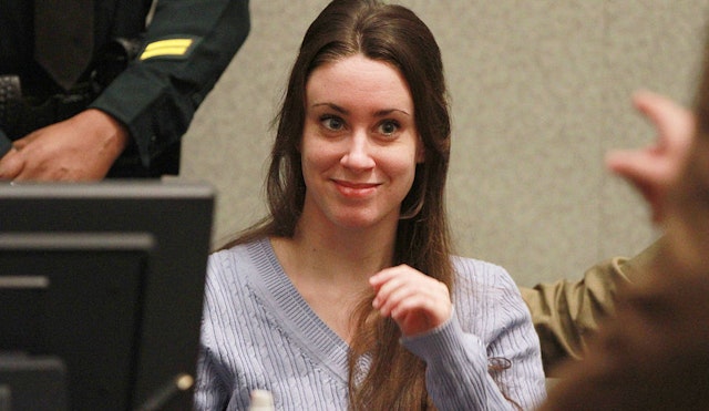Casey Anthony smiles before the start of her sentencing hearing on charges of lying to a law enforcement officer at the Orange County Courthouse July 7, 2011 in Orlando, Florida.