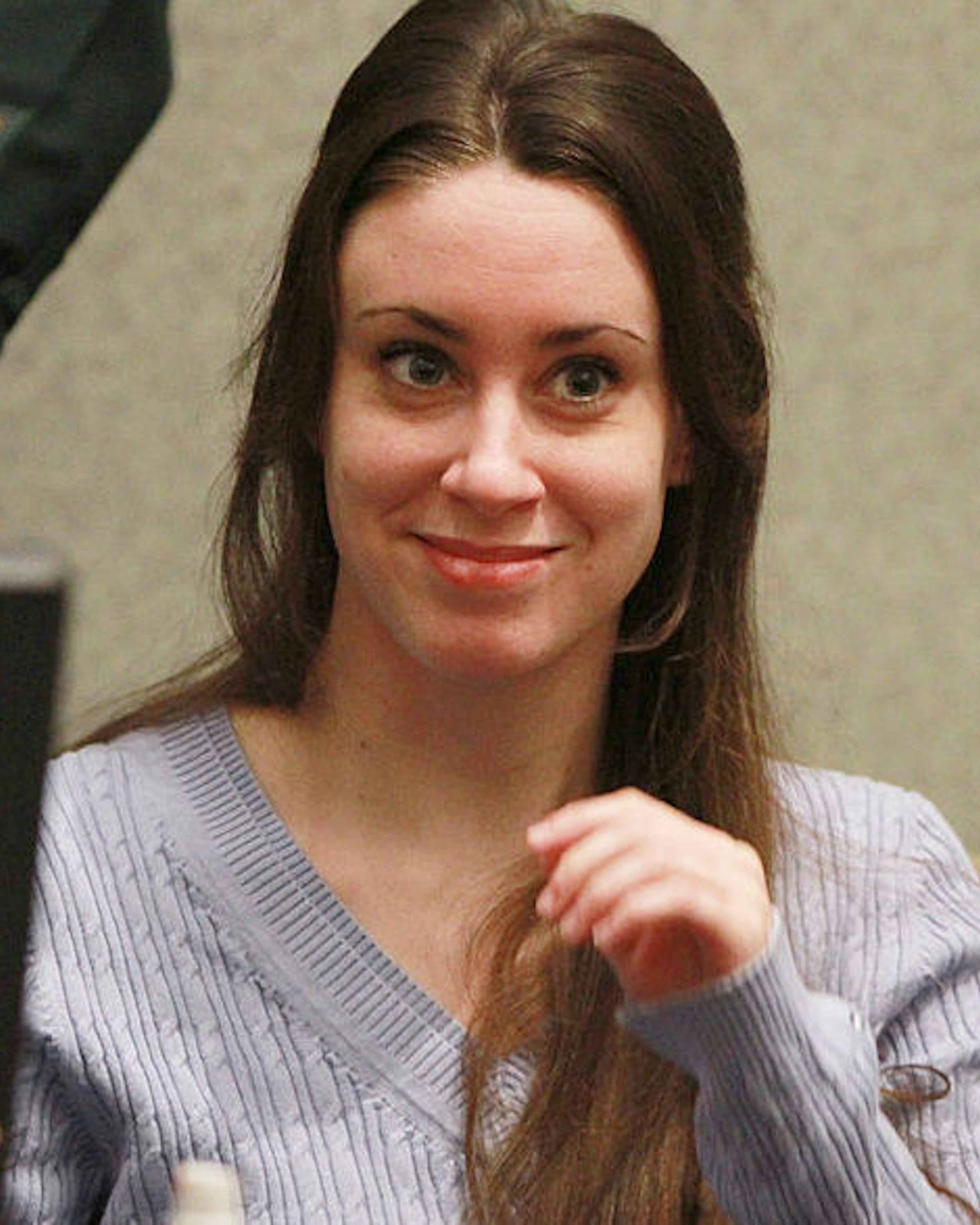 Casey Anthony smiles before the start of her sentencing hearing on charges of lying to a law enforcement officer at the Orange County Courthouse July 7, 2011 in Orlando, Florida.