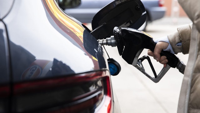 A customer refuels a car at a Royal Dutch Shell PLC gas station in Philadelphia, Pennsylvania, U.S., on Wednesday, March 17, 2021.