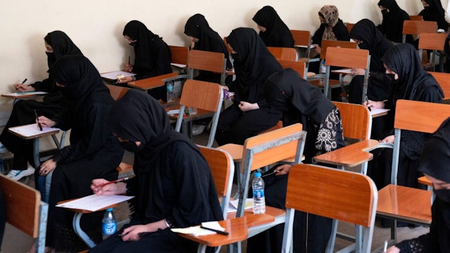 Afghan female students take entrance exams at Kabul University in Kabul on October 13, 2022.