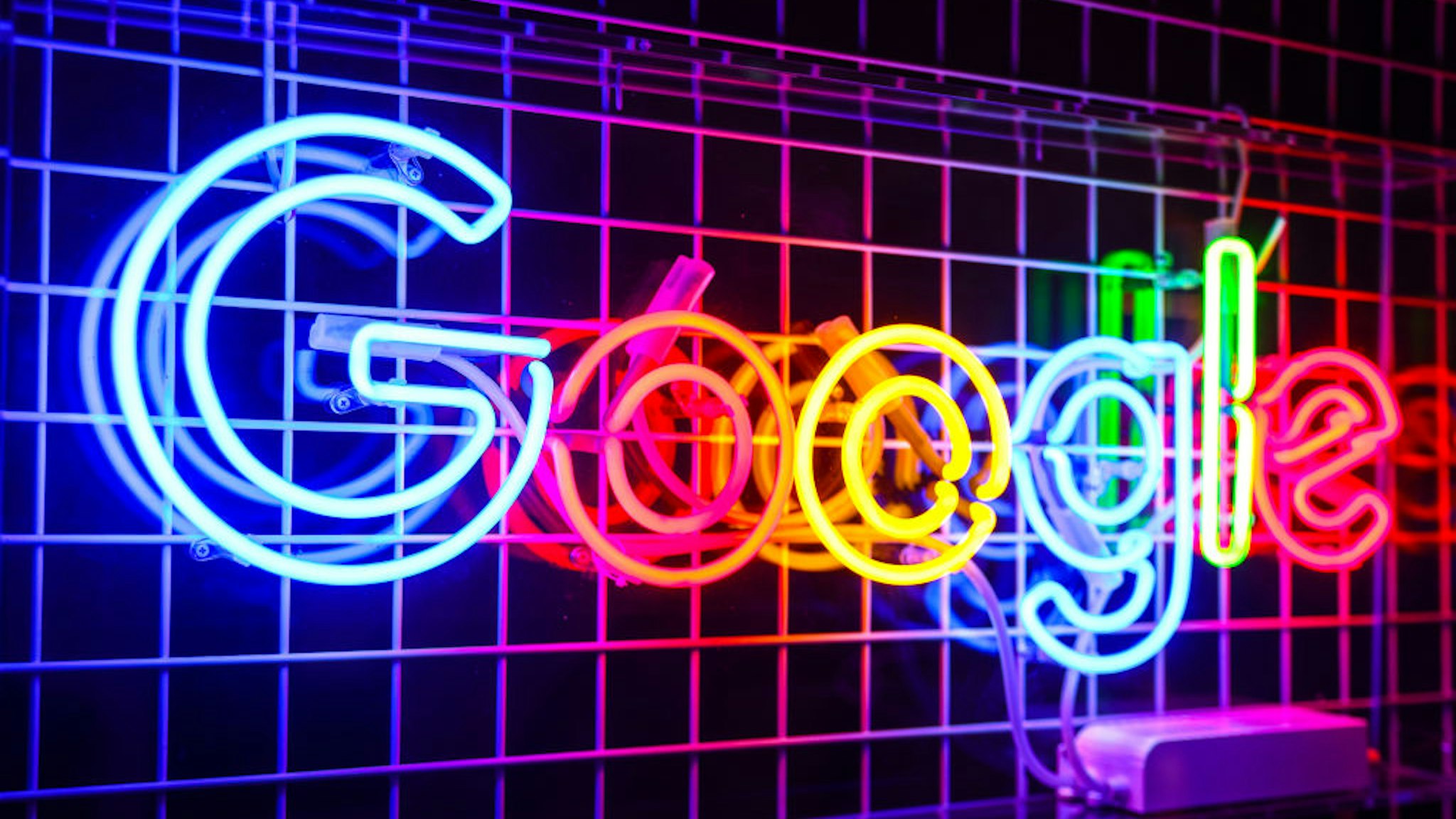 Google neon is seen during the reopening of Google office in a historical building at the Main Square in Krakow, Poland on November 29, 2022. After nearly seven years of absence, Google reopened in Krakow hiring engineers which together with hub in Warsaw will create the largest center in Europe dealing with Google Cloud computing services.