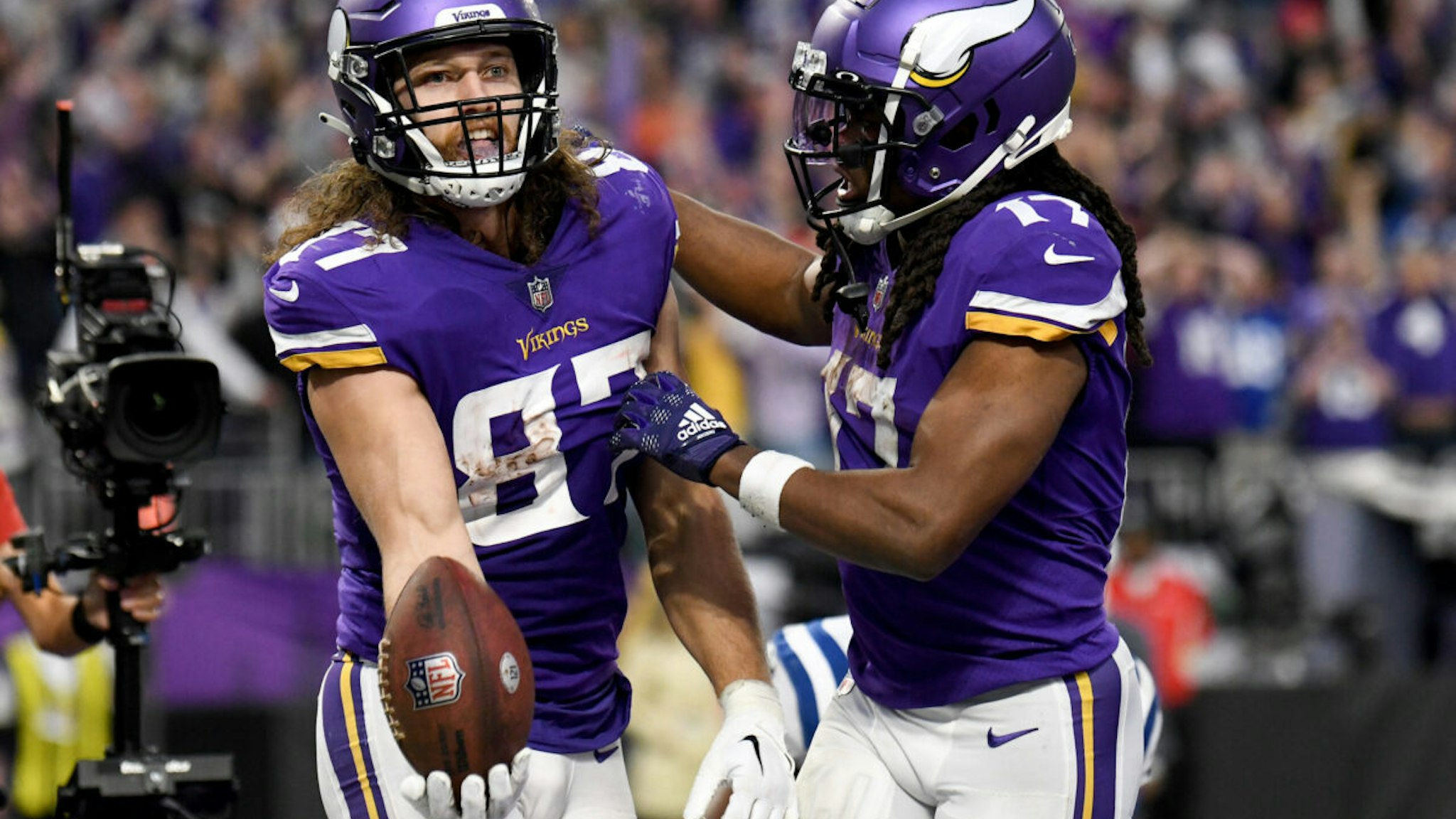 T.J. Hockenson #87 of the Minnesota Vikings celebrates after catching a pass for a successful two point conversion against the Indianapolis Colts during the fourth quarter of the game at U.S. Bank Stadium on December 17, 2022 in Minneapolis, Minnesota.