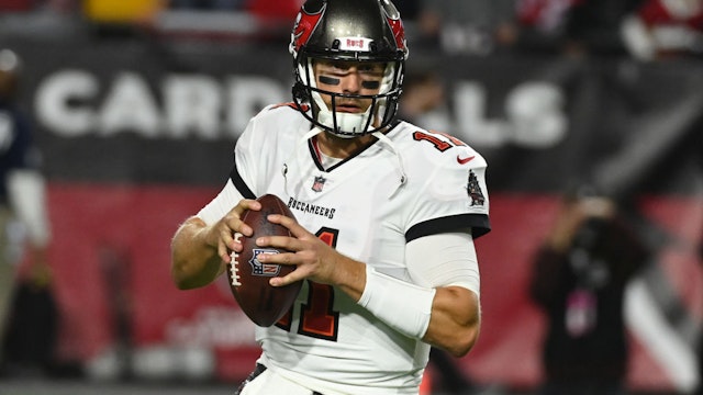 GLENDALE, ARIZONA - DECEMBER 25: Blaine Gabbert #11 of the Tampa Bay Buccaneers prepares for a game against the Arizona Cardinals at State Farm Stadium on December 25, 2022 in Glendale, Arizona.