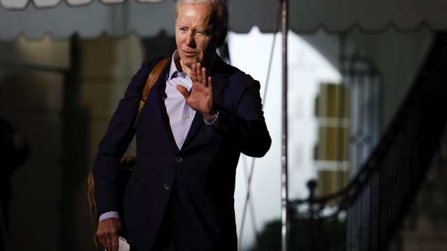 U.S. President Joe Biden walks to speak to reporters as he and first lady Jill Biden leave the White House and walk to Marine One on the South Lawn on December 27, 2022 in Washington, D