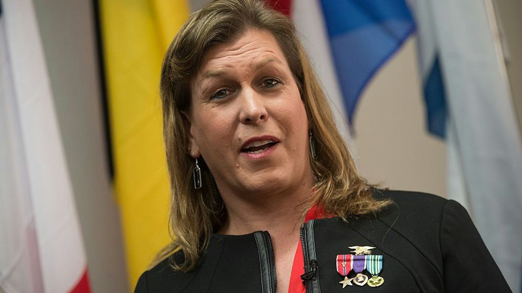 Transgender former US Navy Seal Senior Chief Kristin Beck speaks during a conference entitled "Perspectives on Transgender Military Service from Around the Globe" organized by the American Civil Liberties Union (ACLU) and the Palm Center in Washington on October 20, 2014.
